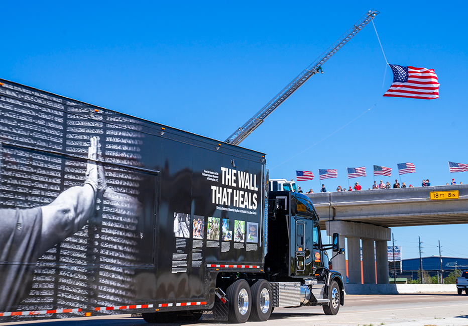 TWTH truck & trailer during escort with flag The Wall That Heals Athens TWTH truck & trailer during escort with flag